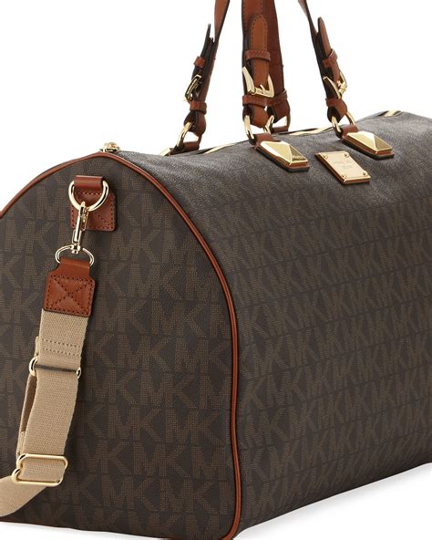 michael kors duffle bag women's|michael kors large suitcase.